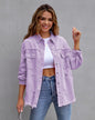 Ripped shirt jacket for women in pink, featuring a stylish design and frayed edges, perfect for casual wear.